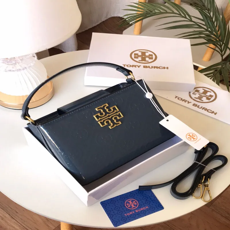 Tory Burch women’s handbag with box, fabric pouch, and authenticity cardشنطة نسائية من توري بورش مع بوكس وكيس قماش وكرت أصلي